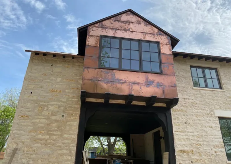 Copper metal panel facade on a stone building for Metal Roof Coating in Wrightsboro